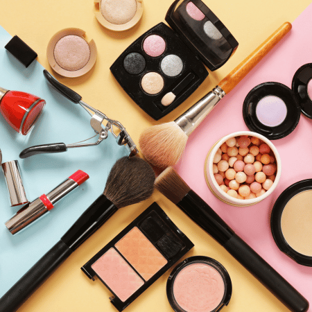 Top view of cosmetic products, especially makeup.